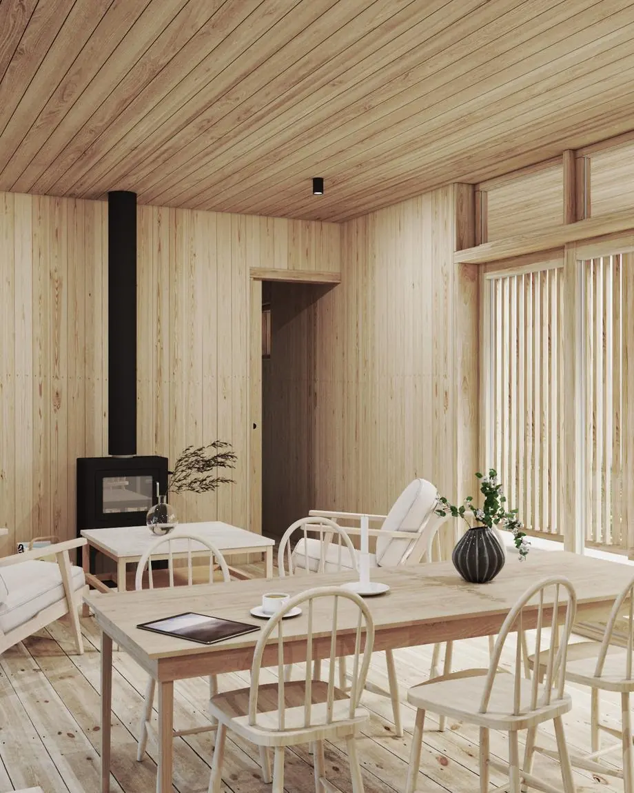 Visualisering: allrum med kamin och matbord i ljust trä i Nära Naturen 62