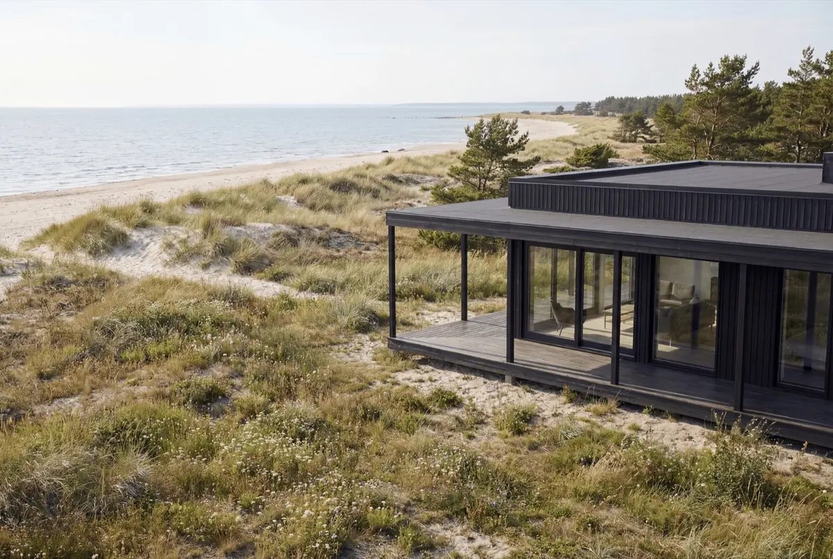 Visualisering: Tofta 50 snett framifrån, med taket runt huset
